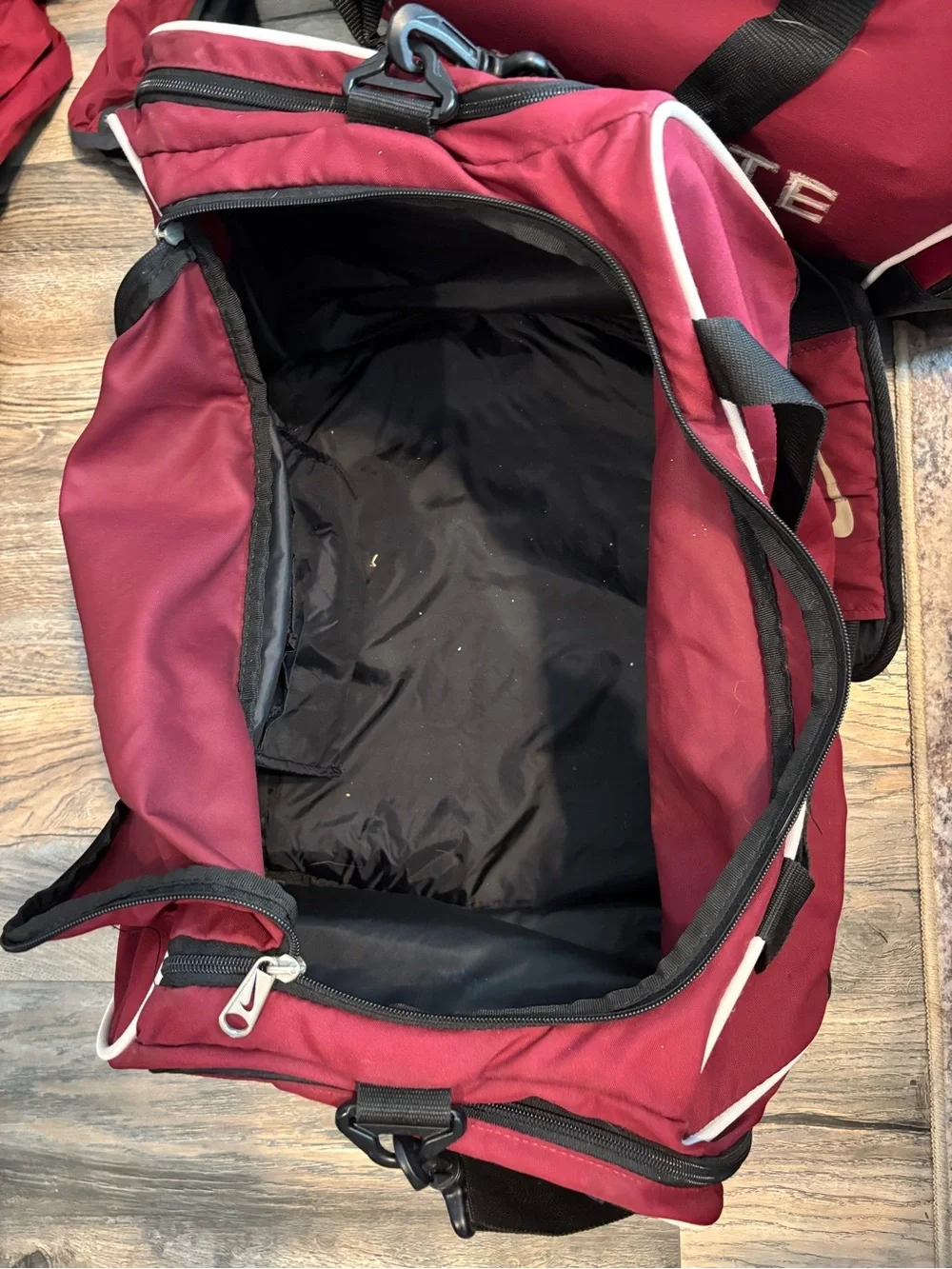 Nike Garnet and Black Men's Duffel Bag with Gold Logo
